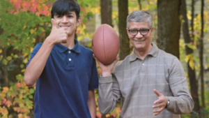 parkinson's patient successfully holds football