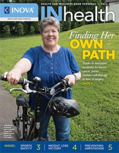 smiling woman next to her bicycle and the words "Finding her own path"