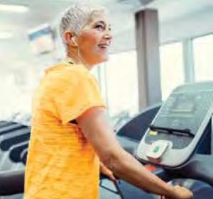 woman working out on treadmill