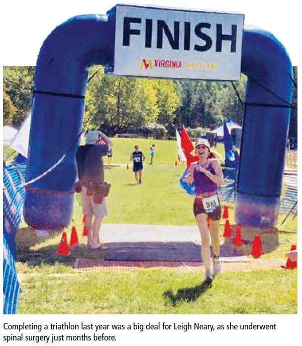 a runner crossing the finish line of a race