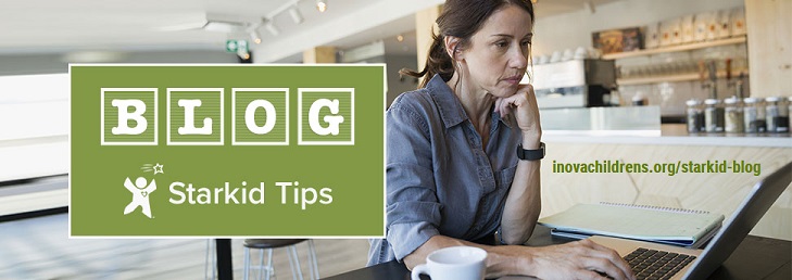 woman reading articles on laptop