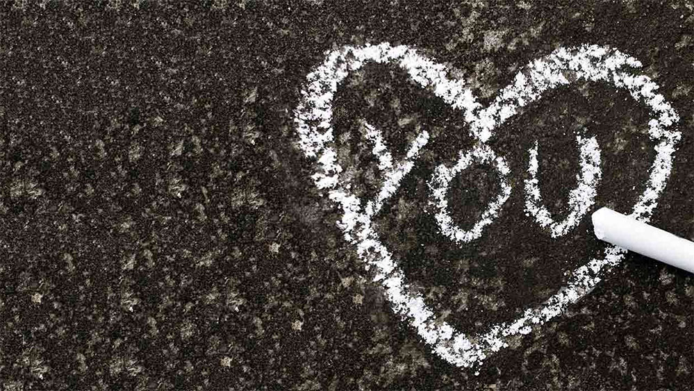 a heart with the word "YOU" in the center
