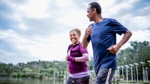 Senior couple jogging in a park